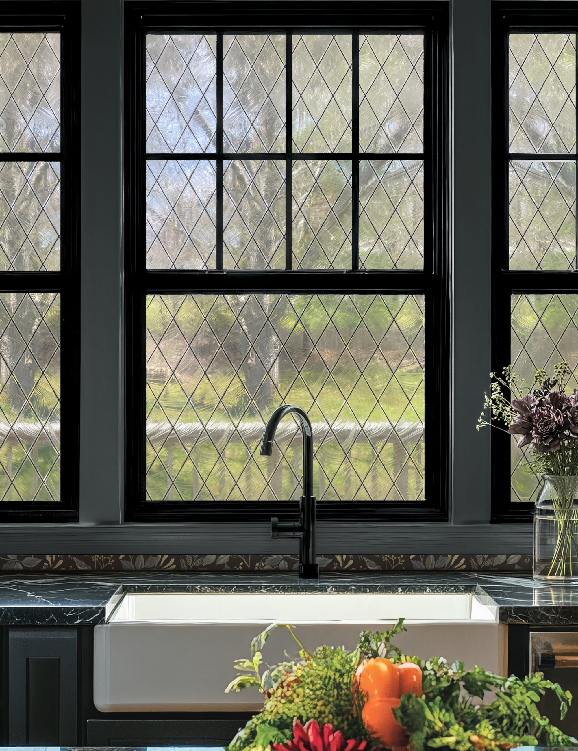 Kitchen sink area with large windows layered with peel-and-stick diamond grid window film
