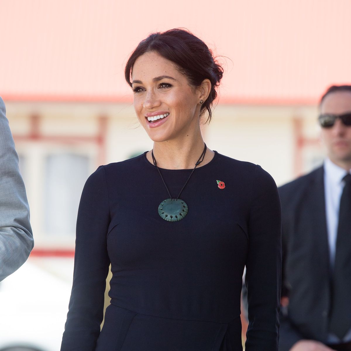Meghan Markle Keeps Her Cool as Royal Family Fans Sing 'Suits' Theme ...