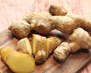 ginger root slices on board