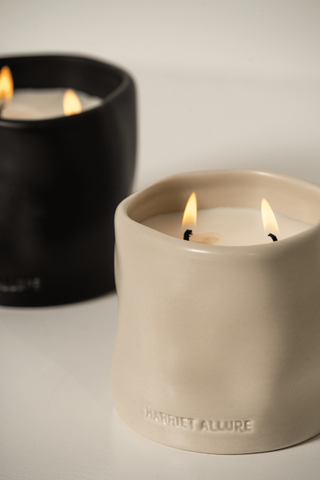 Harriet Allure black and white candles in Minute and Ama
