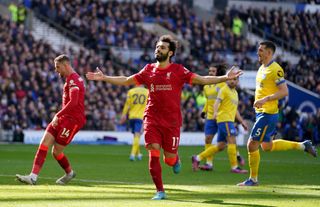 Liverpool’s Mohamed Salah celebrates scoring their side’s second goal of the game during the Premier League match at the AMEX Stadium, Brighton. Picture date: Saturday March 12, 2022
