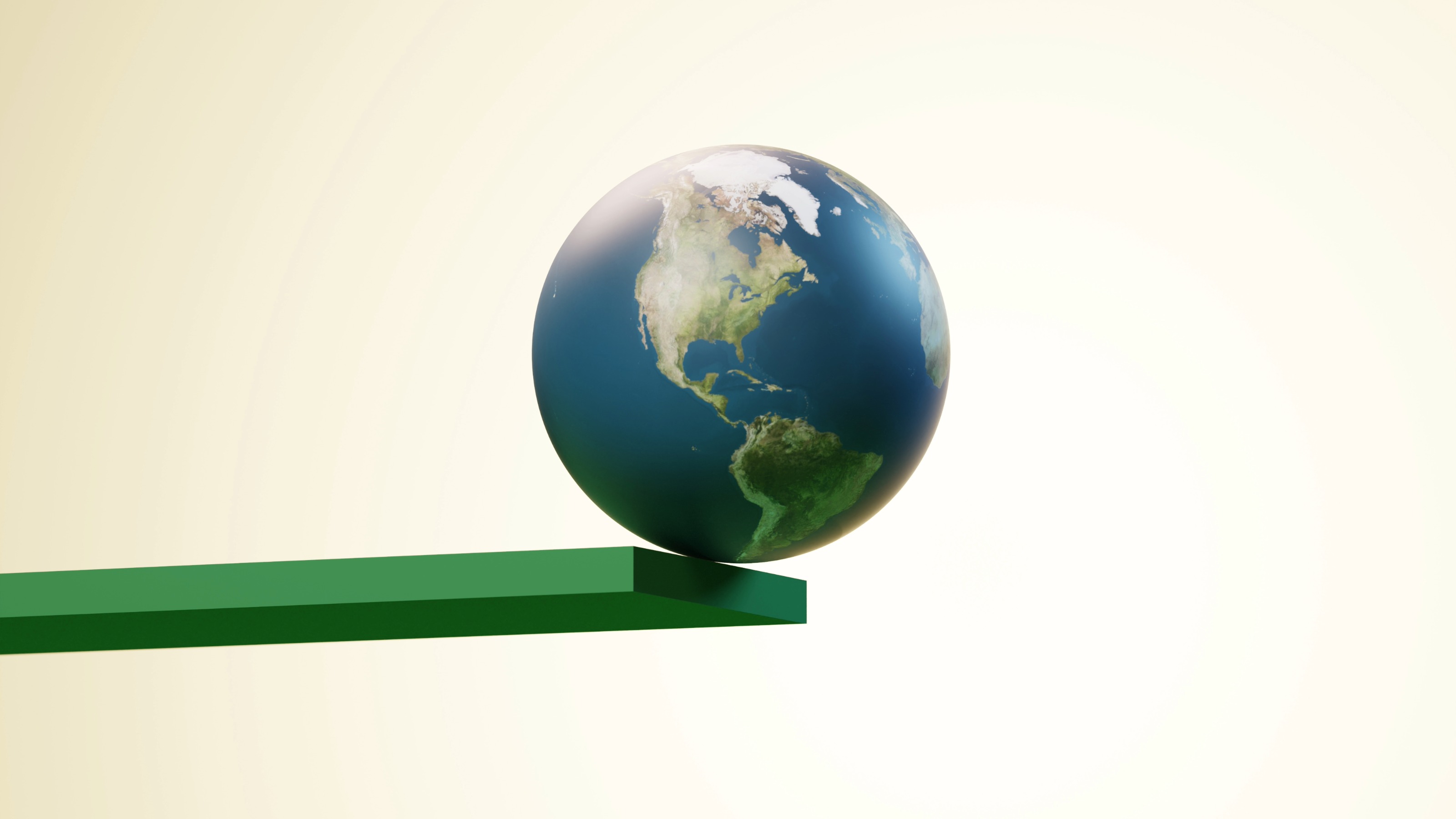Conceptual image of the earth about to fall off the edge of a green plank