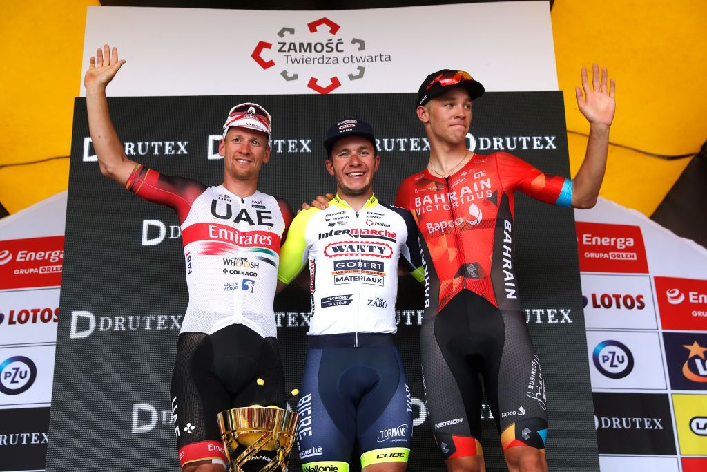 ZAMOSC POLAND JULY 31 LR Pascal Ackermann of Germany and UAE Team Emirates on second place stage winner Gerben Thijssen of Belgium and Team Intermarch Wanty Gobert Matriaux and Jonathan Milan of Italy and Team Bahrain Victorious on third place pose on the podium ceremony after the 79th Tour de Pologne 2022 Stage 2 a 2056km stage from Chem to Zamo TdP22 WorldTour on July 31 2022 in Zamosc Poland Photo by Bas CzerwinskiGetty Images