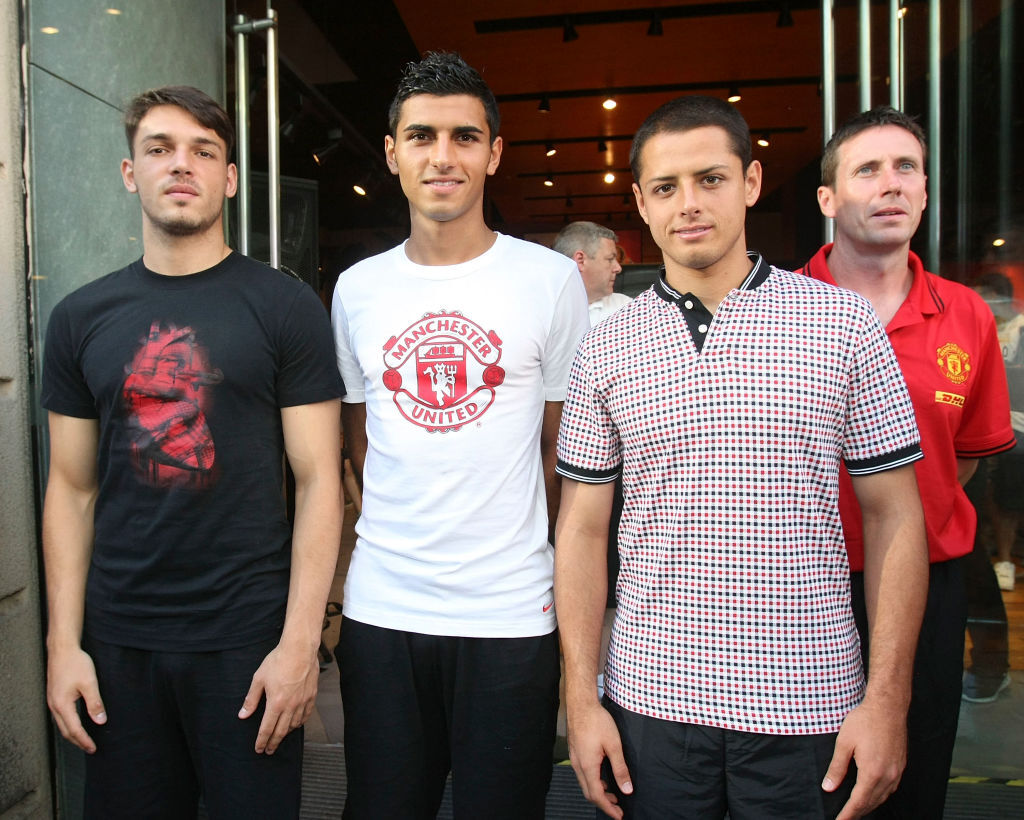 Manchester United player Davide Petrucci and Javier Hernandez