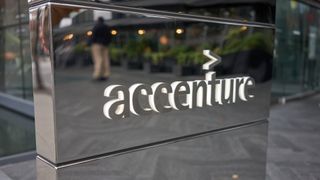 The Accenture sign on a mirrored block 