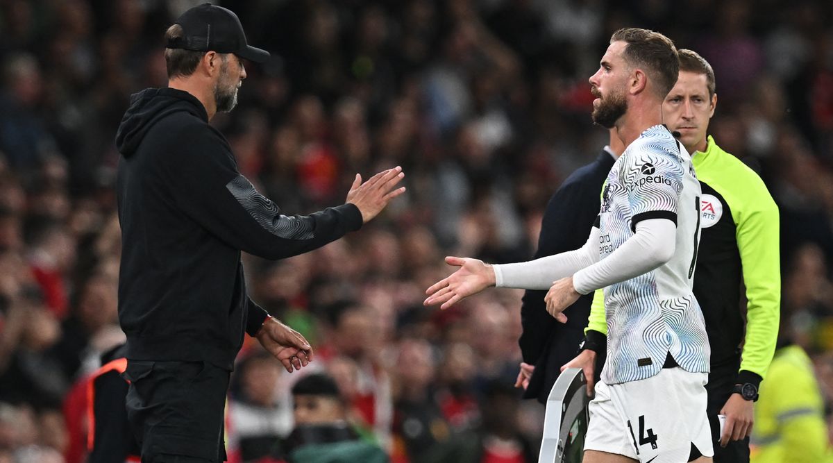 Liverpool manager Jurgen Klopp acknowledges Liverpool captain Jordan Henderson as the latter is substituted during the Premier League match between Manchester United and Liverpool on 22 August, 2022 at Old Trafford, Manchester, United Kingdom