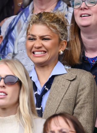 Zendaya, wearing Ralph Lauren, court-side of Centre court on day thirteen of the Wimbledon Tennis Championships at the All England Lawn Tennis and Croquet Club on July 13, 2024 in London, England.