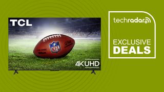 TCL 55-inch Class F35-Series 4K UHD HDR LED Smart Fire TV 2025 with NFL football screensaver on green background with TechRadar exclusive deals sign