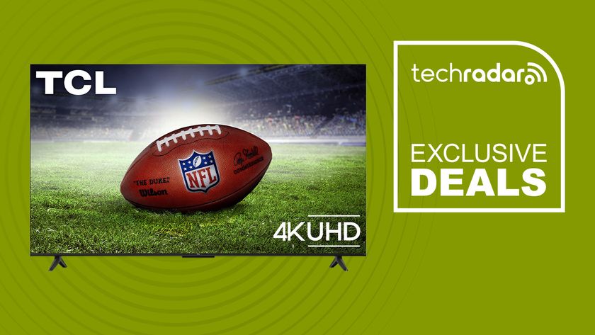 TCL 55-inch Class F35-Series 4K UHD HDR LED Smart Fire TV 2025 with NFL football screensaver on green background with TechRadar exclusive deals sign