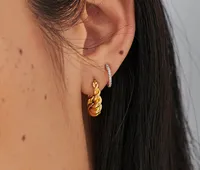 13. Missoma Gold Mini Tidal Hoop Earrings