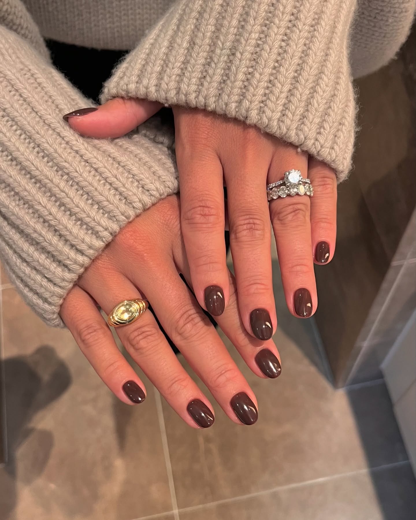 Brown engagement nails.