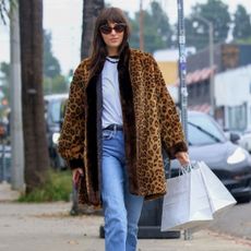 An image of Dakota Johnson wearing one of 2026's biggest trainer trends.