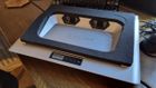 Assorted images of the Klim Everest laptop cooler, and everything included inside the box