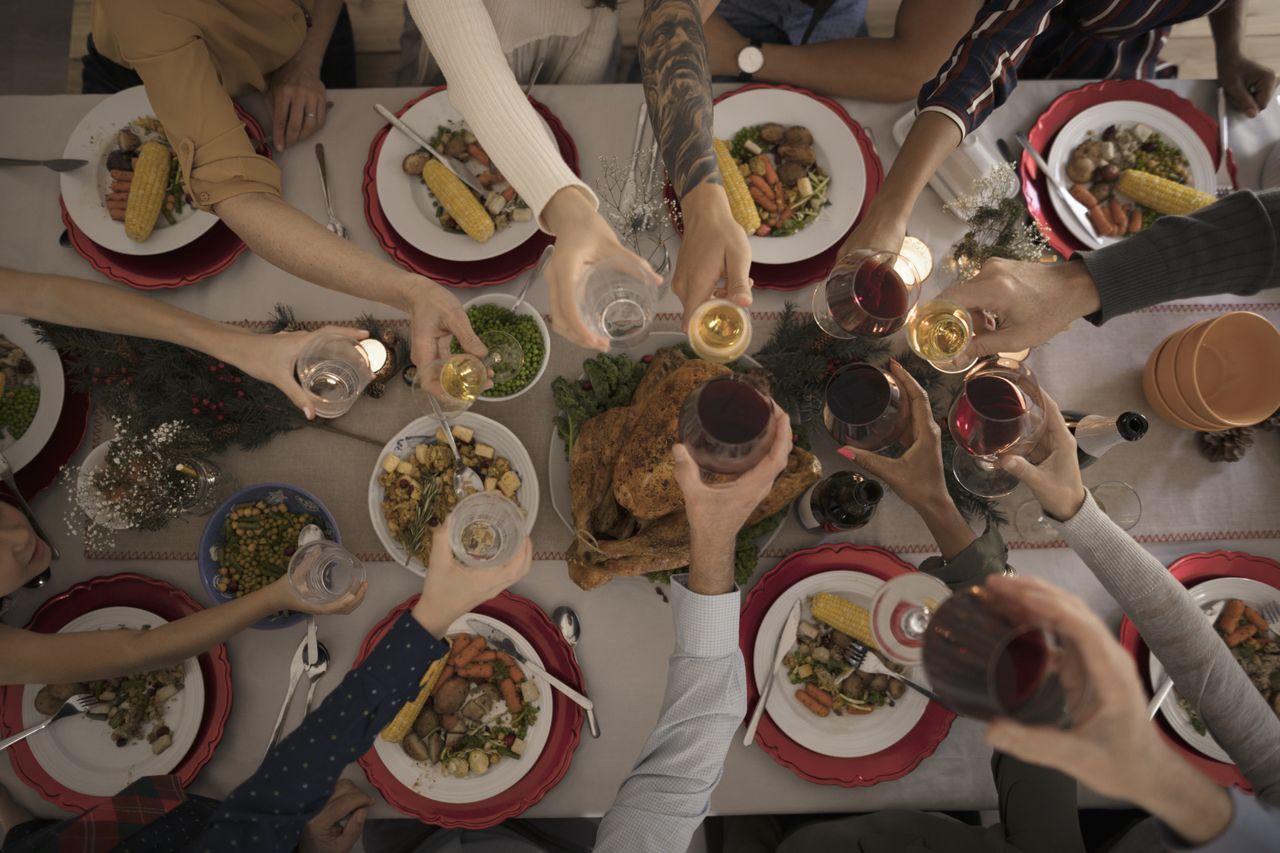 Family toasting wineglasses