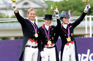 Olympic Equestrian Team Dressage, London 2012: Gold medal winners Great Britain left to right, Carl Hester, Laura Bechtolsheimer and Charlotte Dujardin. It was Britain's first ever Olympic Dressage medal. (Picture: Alamy)