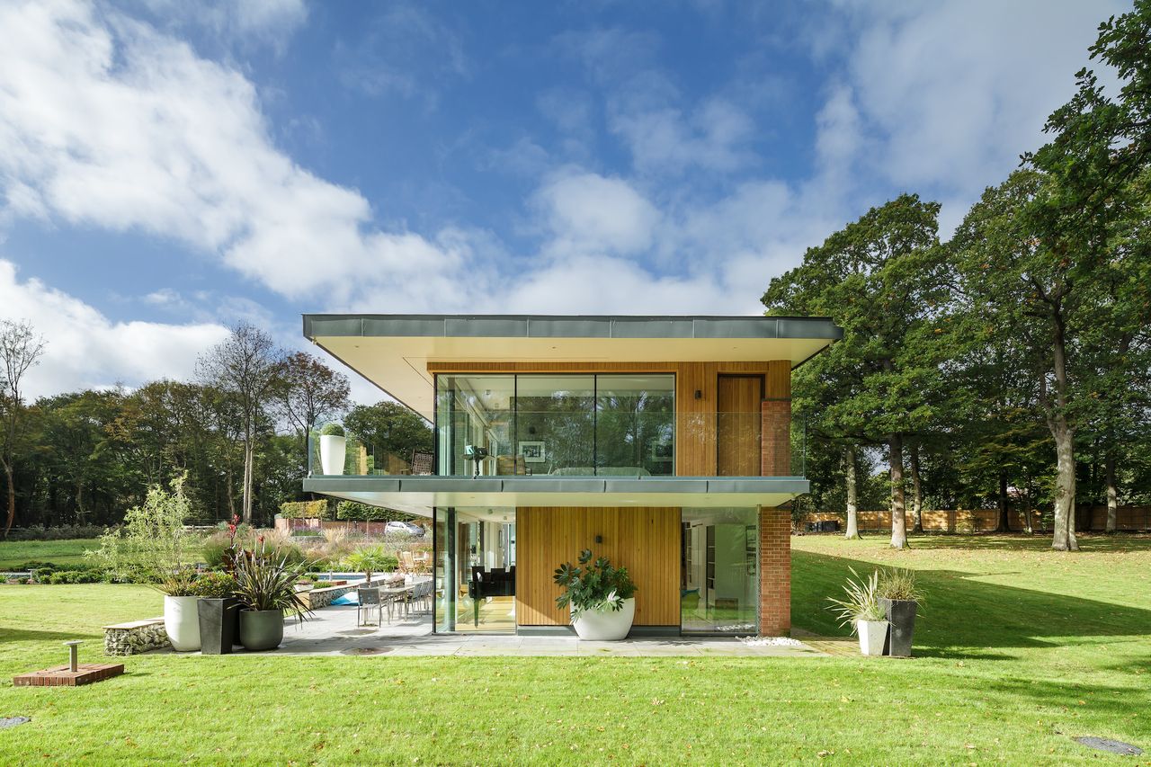 side view of contemporary self build with timber cladding