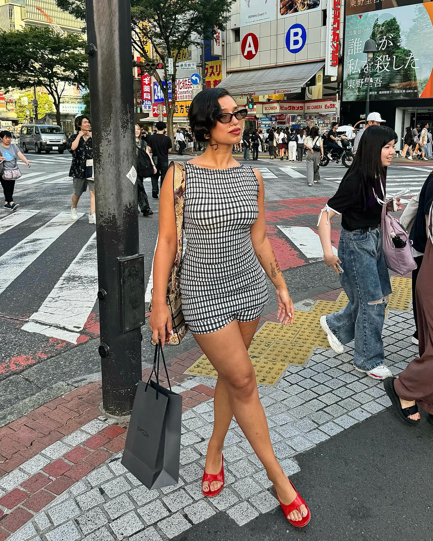 An image of @raye wearing one of the best gingham tops.
