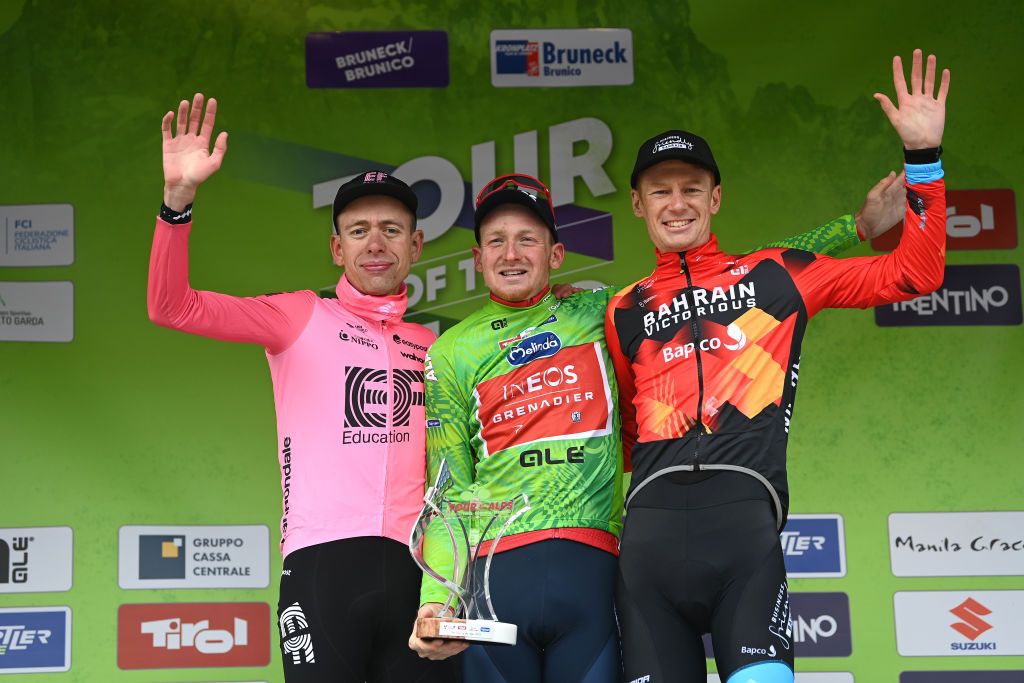 BRUNICO ITALY APRIL 21 LR Hugh Carthy of United Kingdom and Team EF EducationEasypost on second place race winner Tao Geoghegan Hart of United Kingdom and Team INEOS Grenadiers Green Leader Jersey and Jack Haig of Australia and Team Bahrain Victorious on third place pose on the podium ceremony after the 46th Tour of the Alps 2023 Stage 5 a 1445km stage from Cavalese to Brunico on April 21 2023 in Brunico Italy Photo by Tim de WaeleGetty Images