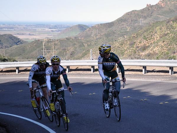 Scott Zwizanski (left) and Cheyne Hoag focus on climbing while Zach Bell (right) checks the progress of their teammates further back.