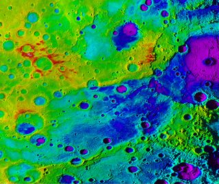 Using colorized topography, Mercury’s "great valley" (dark blue) and Rembrandt impact basin (purple, upper right) are revealed in this high-resolution digital elevation model merged with an image mosaic obtained by NASA’s MESSENGER spacecraft.