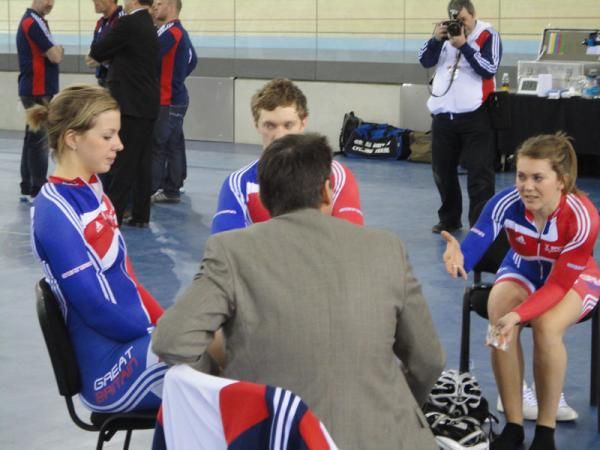 Seb Coe talks with some of the 2012 track team