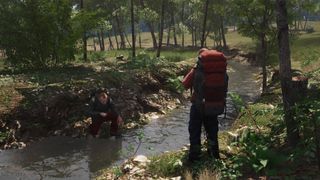 Two Scum players stop for water at a creek.