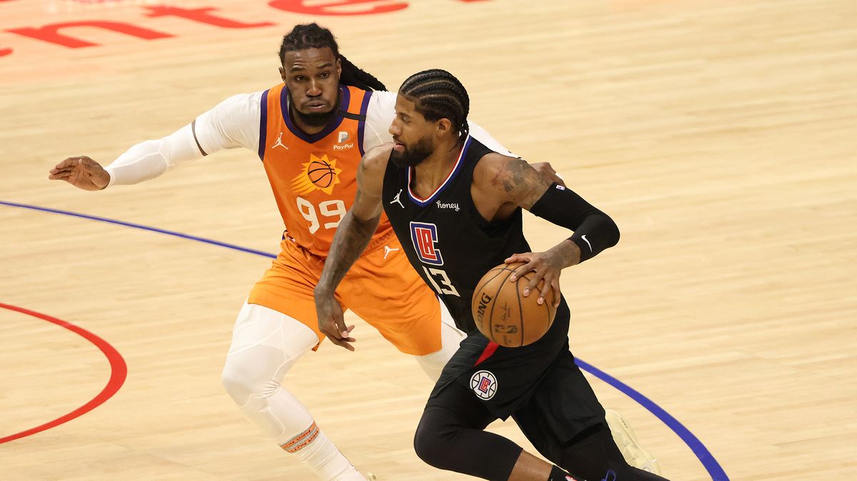 Paul George #13 of the LA Clippers drives against Jae Crowder #99 of the Phoenix Suns during the second half in Game Six of the Western Conference Finals at Staples Center on June 30, 2021 in Los Angeles