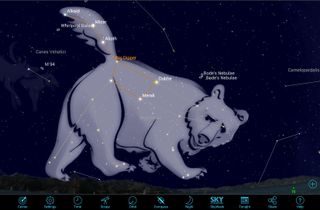 The Big Dipper, shown as it appears at 7 p.m. every September, is one of the most well-known asterisms visible from mid-northern latitudes. It is formed by taking the seven brightest stars from the much larger constellation Ursa Major (Big Bear). The pairs of close-together stars marking the bear's front and two rear paws form another asterism called the Three Leaps of the Gazelle.