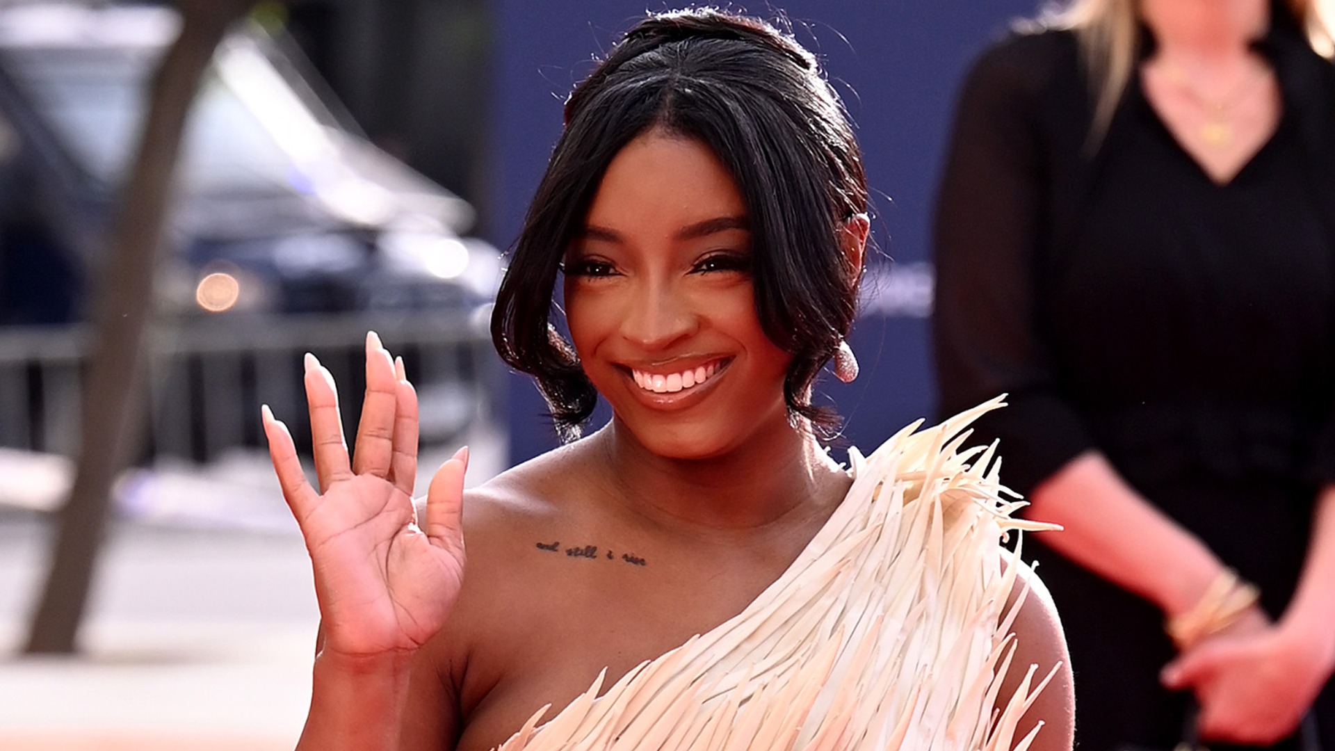 Simone Biles wore a feather high-low dress on the World Sports Awards 2026 red carpet 