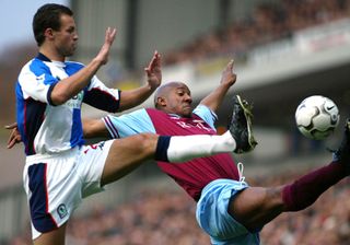 Dion Dublin stretches for a ball in a game for Aston Villa against Blackburn Rovers in November 2002.