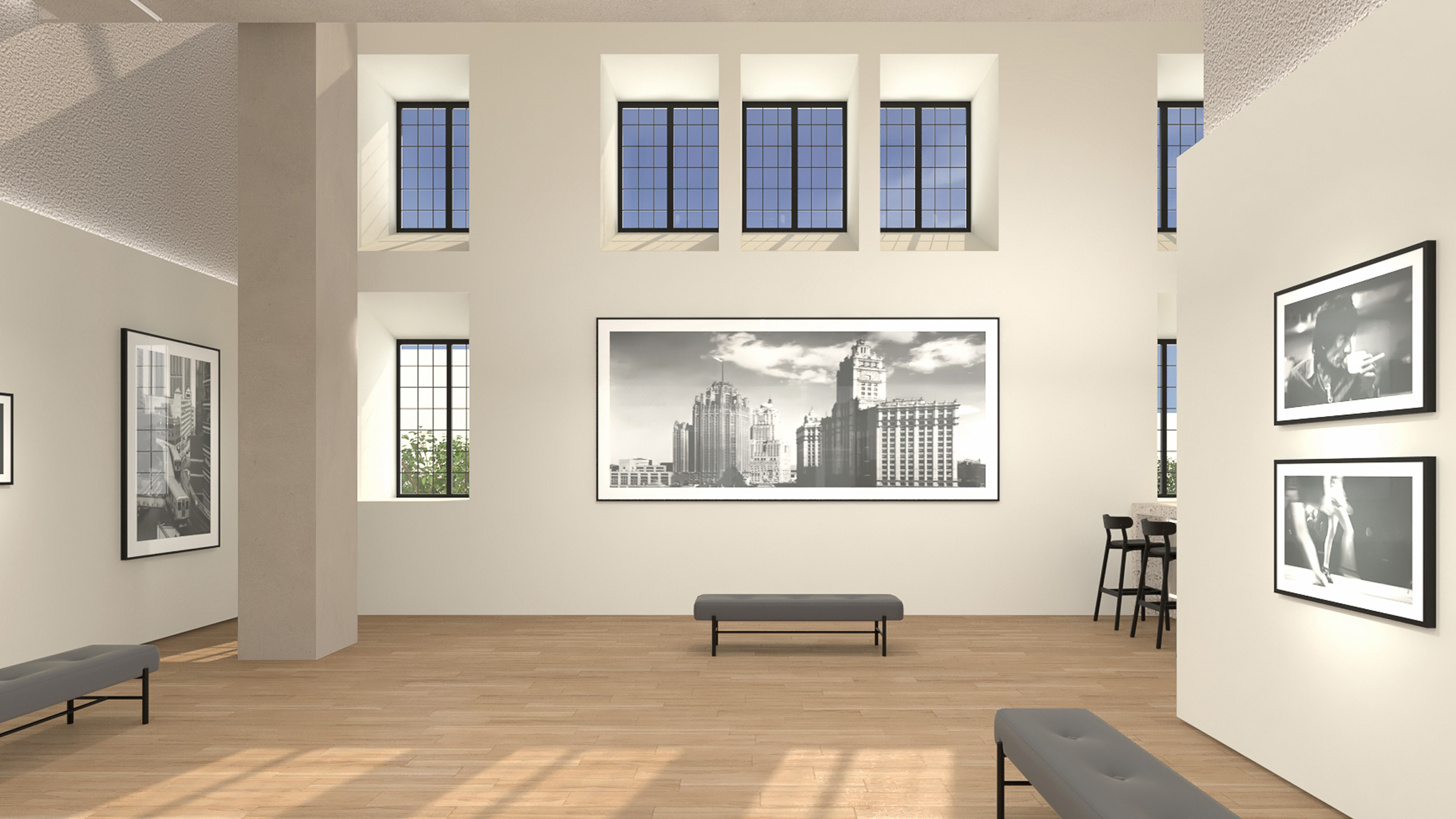 The Leica Chicago store gallery, an open and wide space featuring multiple photographs of architecture in black and white