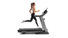 NordicTrack Commercial 2950 treadmill review: image shows woman running on NordicTrack Commercial 2950 treadmill 