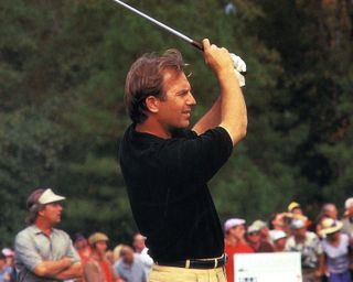 kevin coster swings a golf club in the movie tin cup