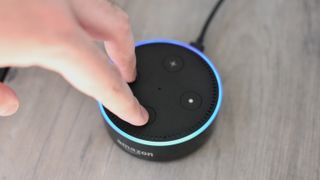 How to reset Echo Dot: On 2nd Gen model, hold down the Microphone Off and Volume Down buttons until the light turns orange