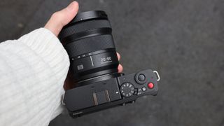 Panasonic Lumix S9 camera with a lens attached held in a hand