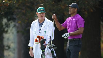 Tiger Woods and caddie deliberate shot at the Masters