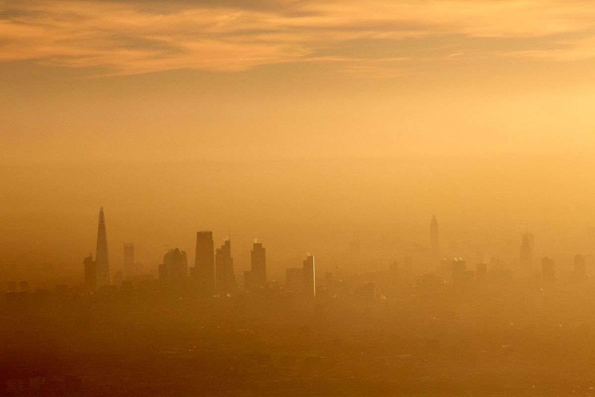 Aerial view South across the city of London in fog and or air pollution