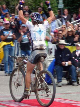 Rebecca Rusch (Specialized) rides the red carpet to a win at Leadville.