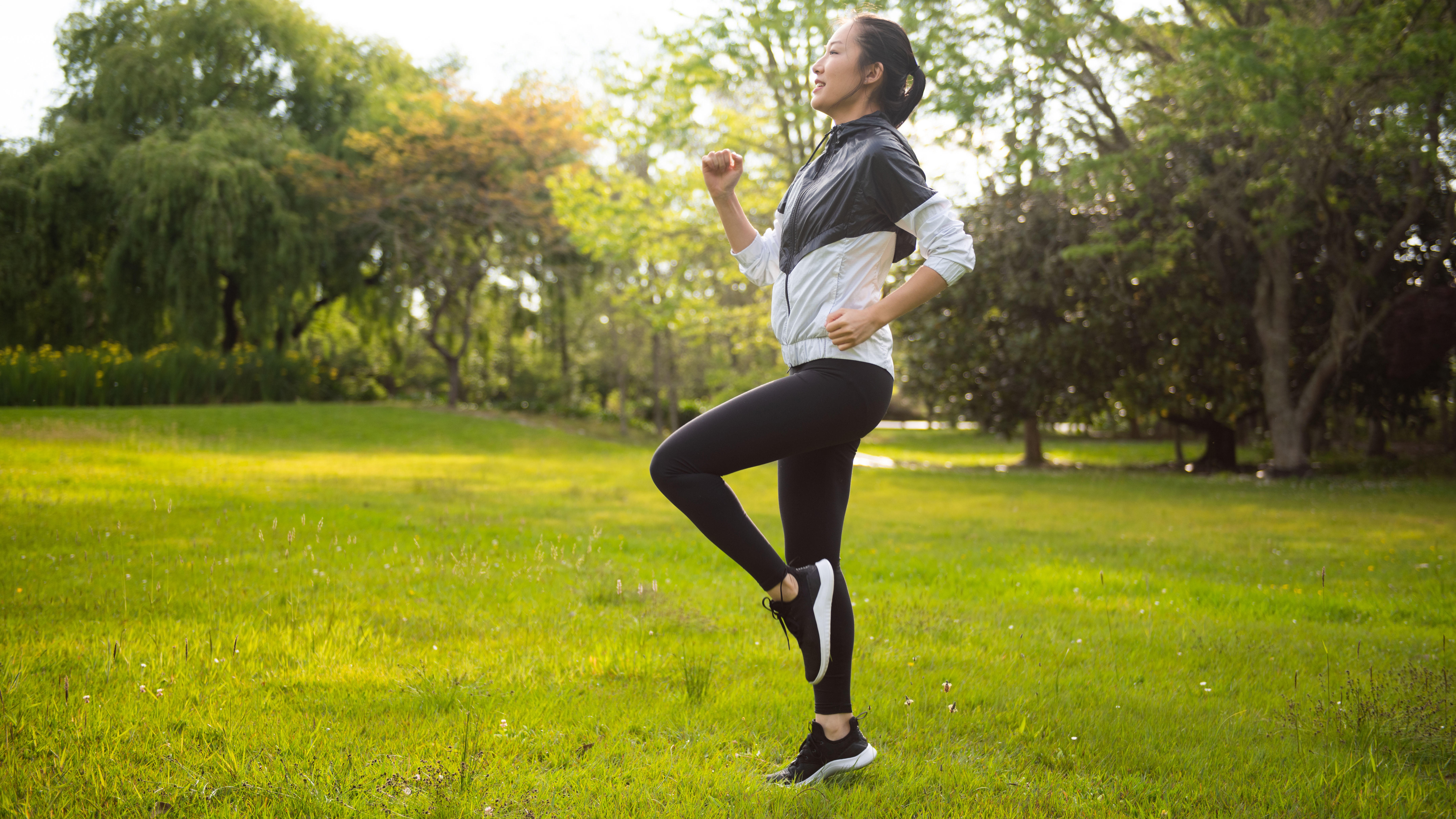 Person doing upright running in park