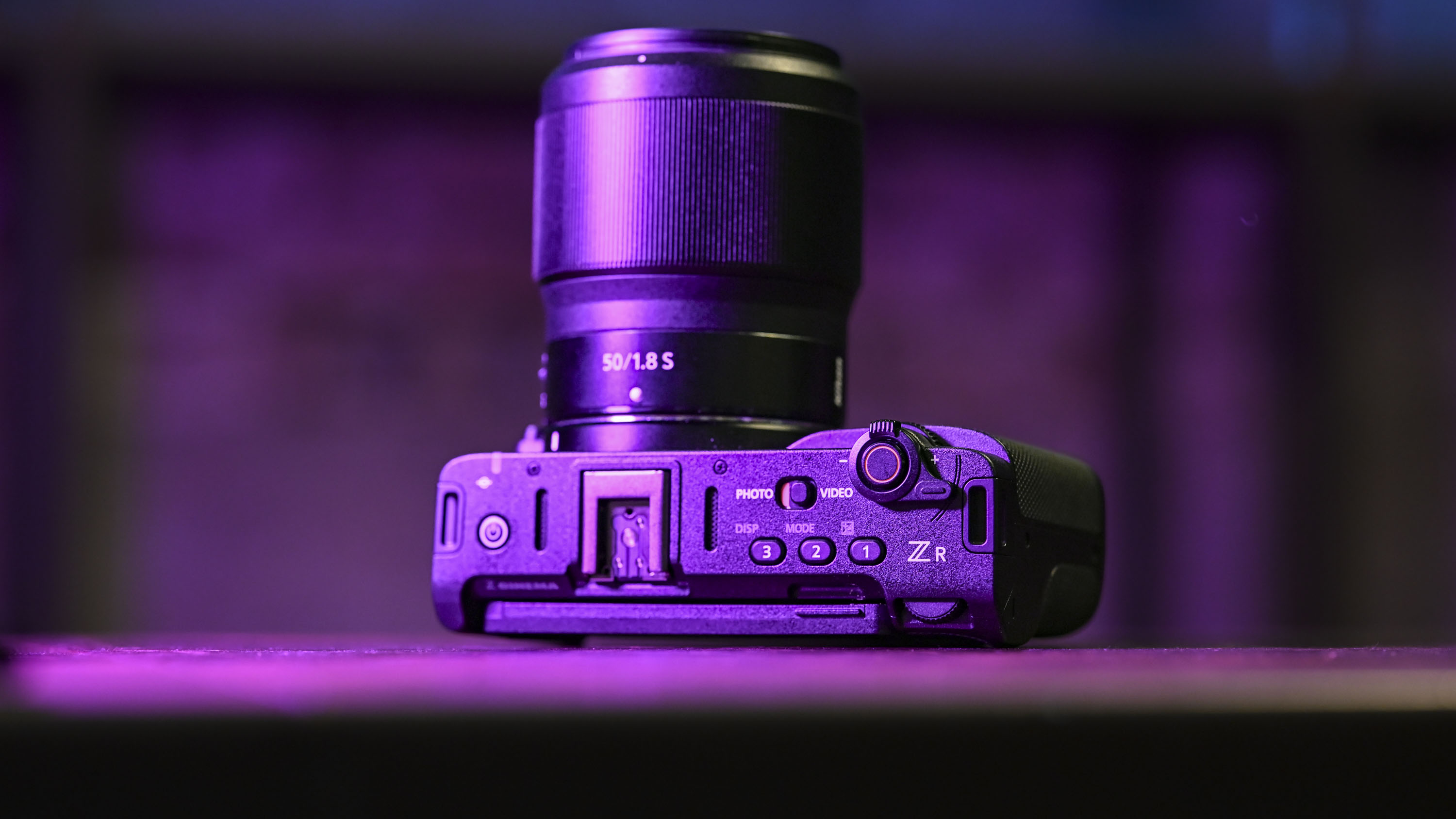 Nikon ZR camera under low key magenta lighting