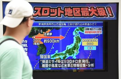 Japan is considering buying missiles as a defense from North Korea.