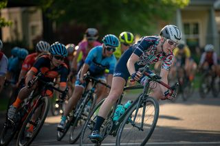Brenna Wrye-Simpson racing with DNA Pro Cycling on the road