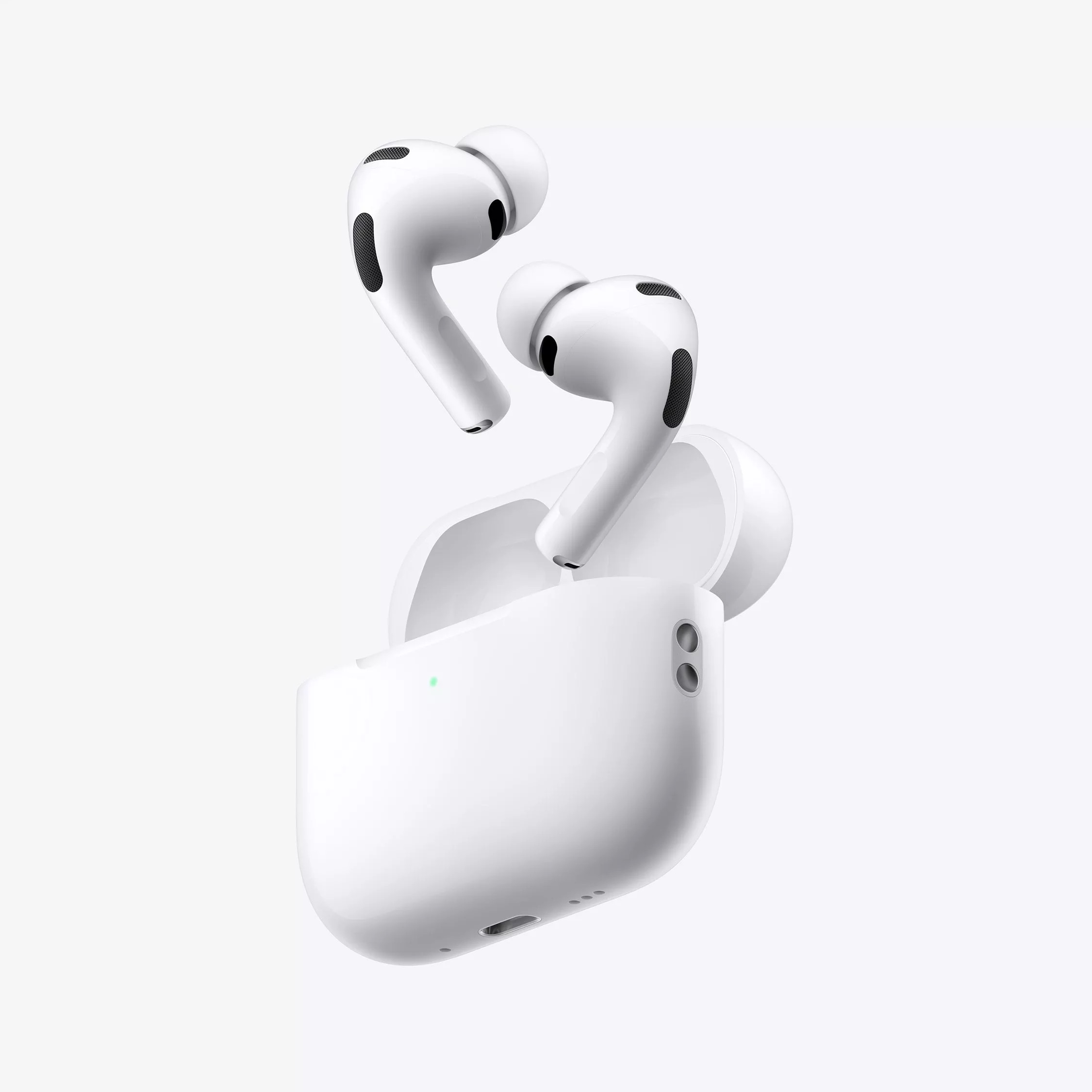 The AirPods Pro 3 earbuds coming out of their charging case at a 3/4 angle.