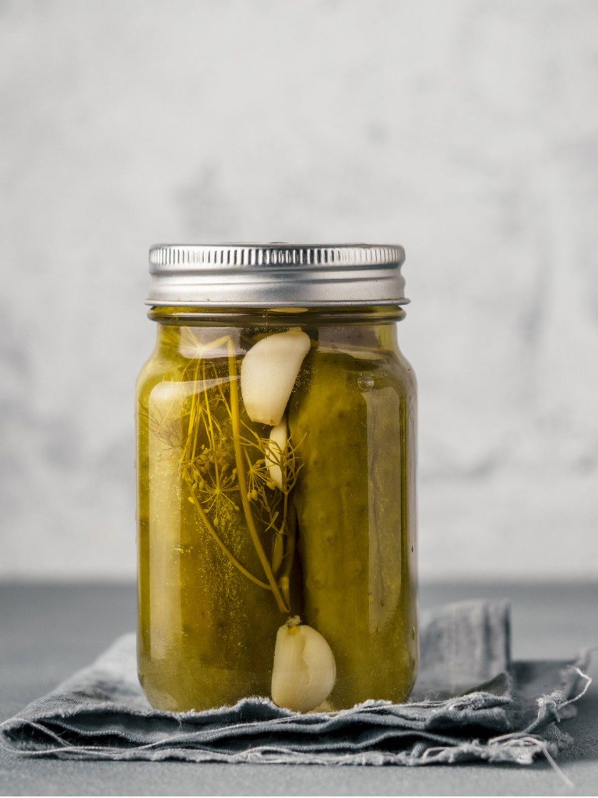 Jar Of Pickles And Garlic Cloves