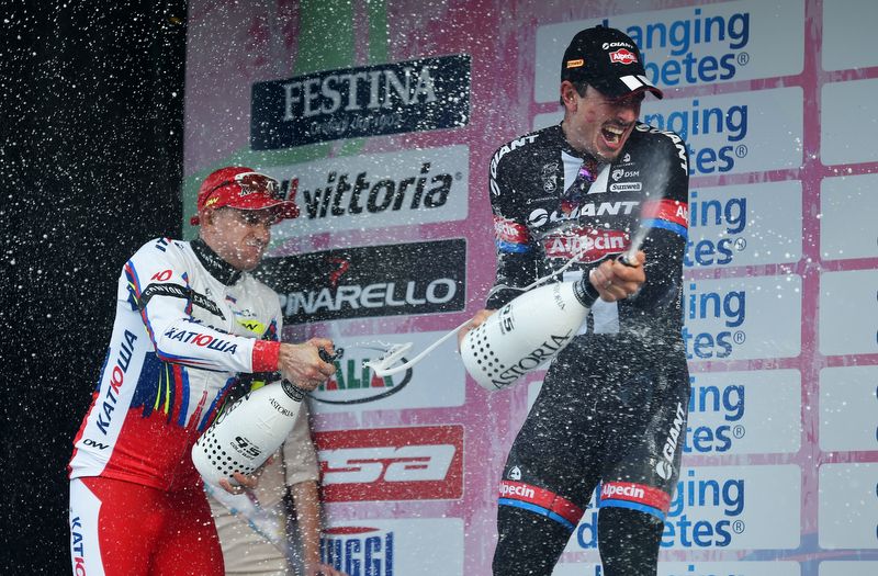 Alexander Kristoff and John Degenkolb enjoying the champagne showers of the podium