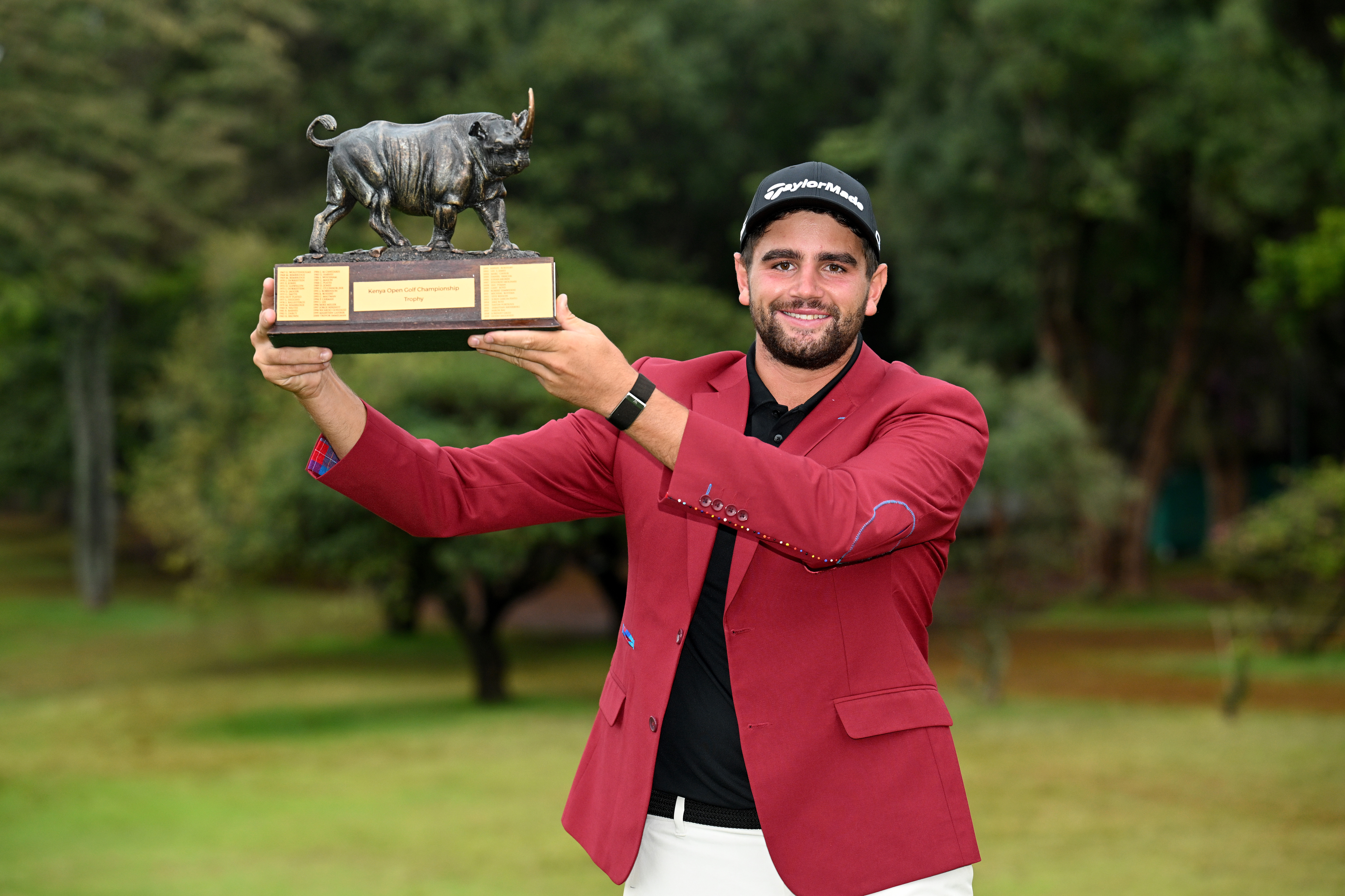 Casey Jarvis holds the Magical Kenya trophy