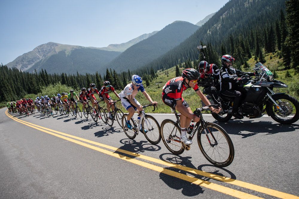 Teams chase on the front heading into the final climb