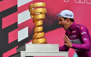Arnaud Demare likes the Giro d'Italia trophy
