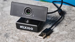 A black NexiGo N60 wired webcam