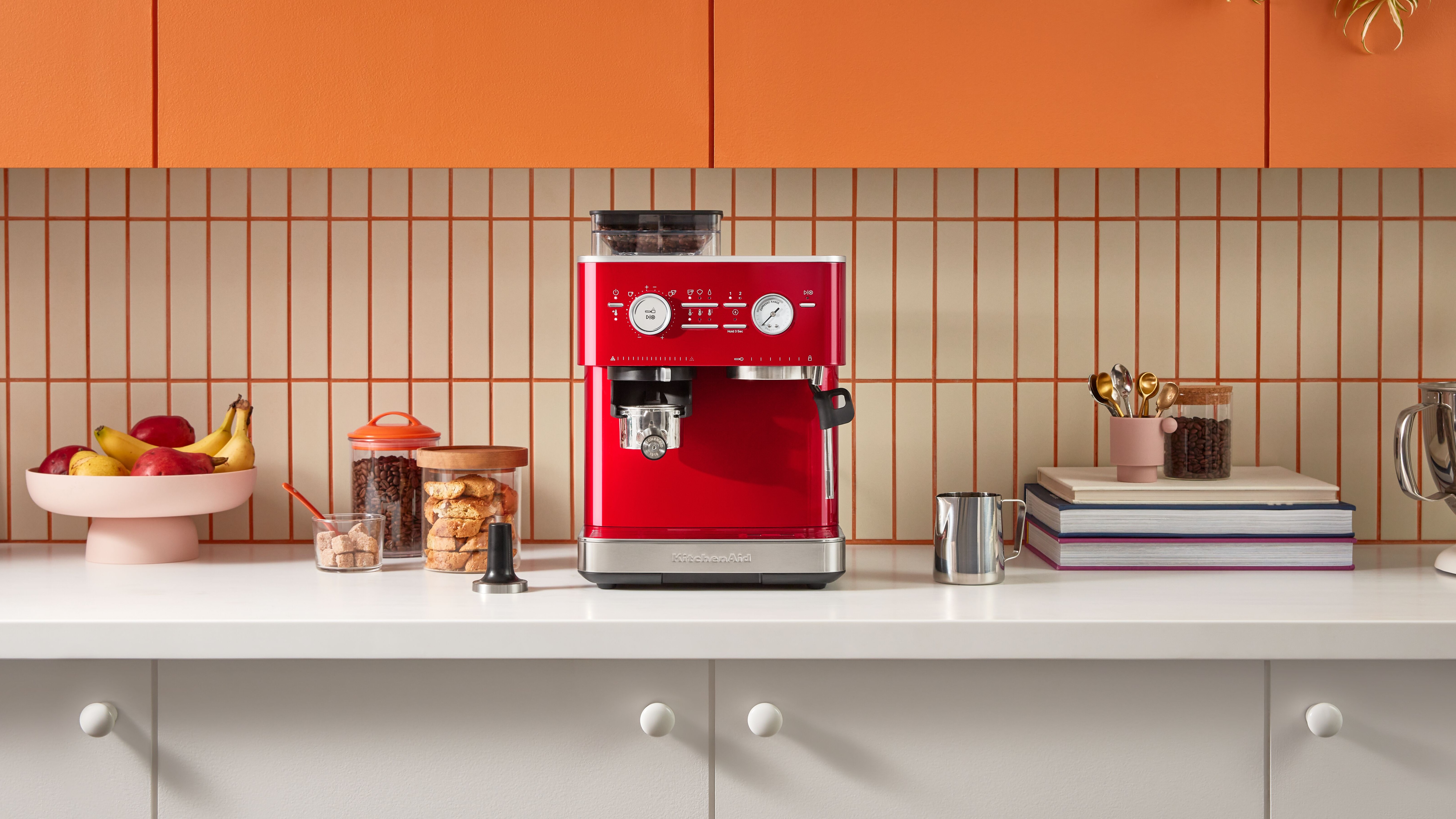 KitchenAid Semi Automatic Espresso Machine in Candy Apple red on kitchen counter
